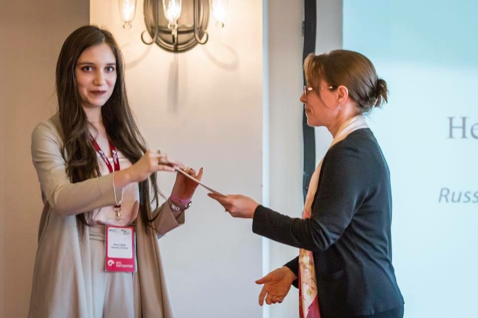 Anna Lukina receiving the prize with Virginia Harper Ho YCC President