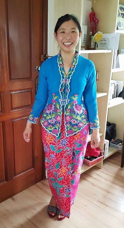 Ellen in her colourful and patterned Malaysian native dress