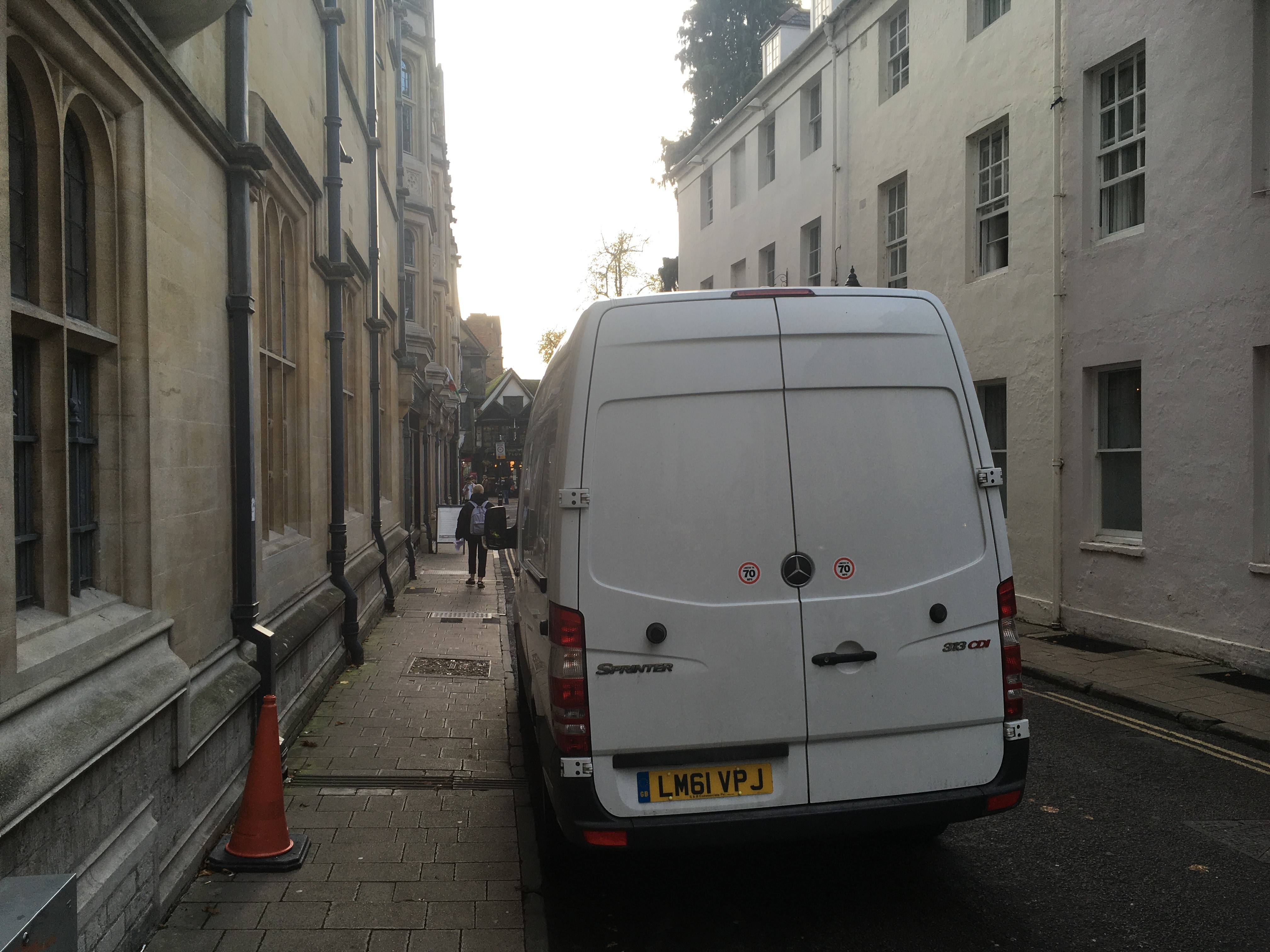 van leaving jesus college with books for renmin university 