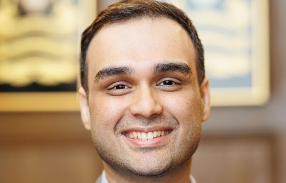 Headshot of Advait Tambe looking at the camera