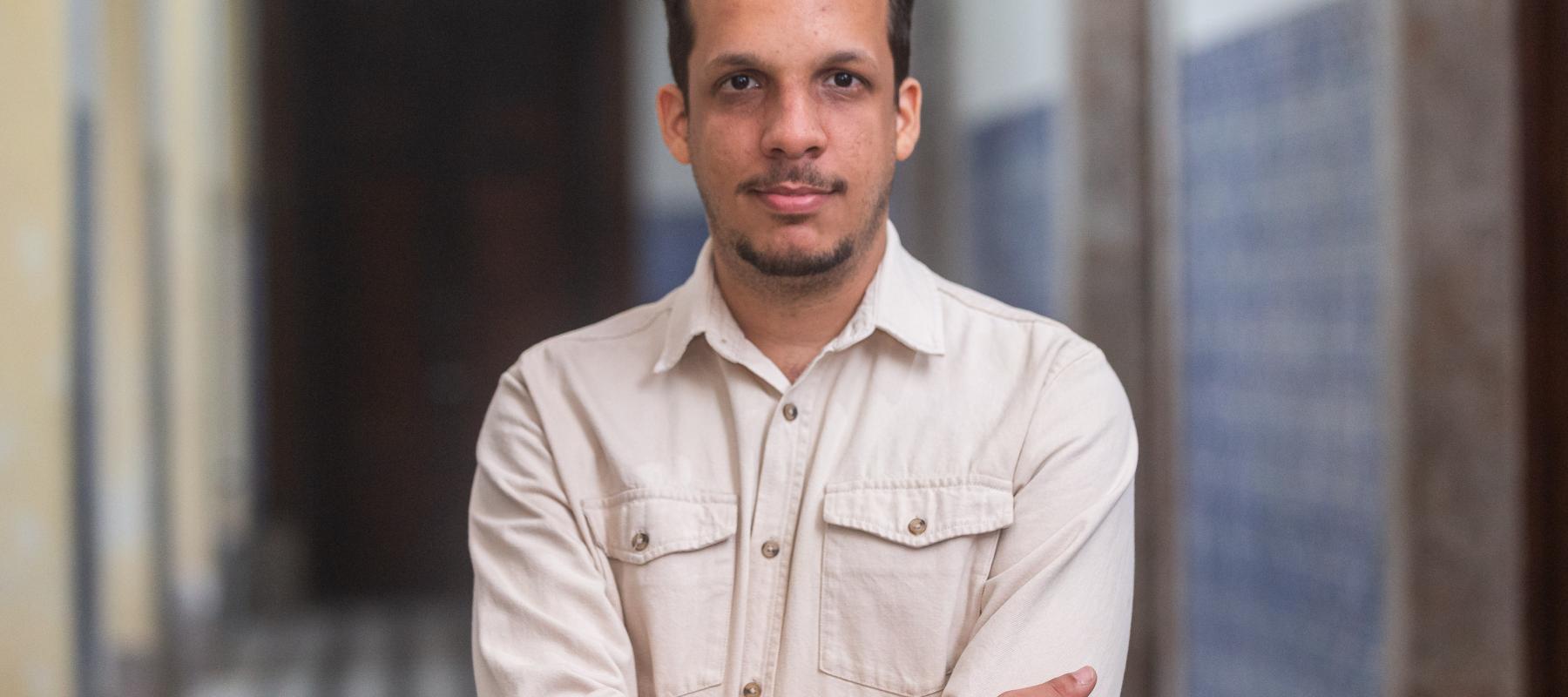 Carlos Eduardo Barros, he is wearing a white shirt