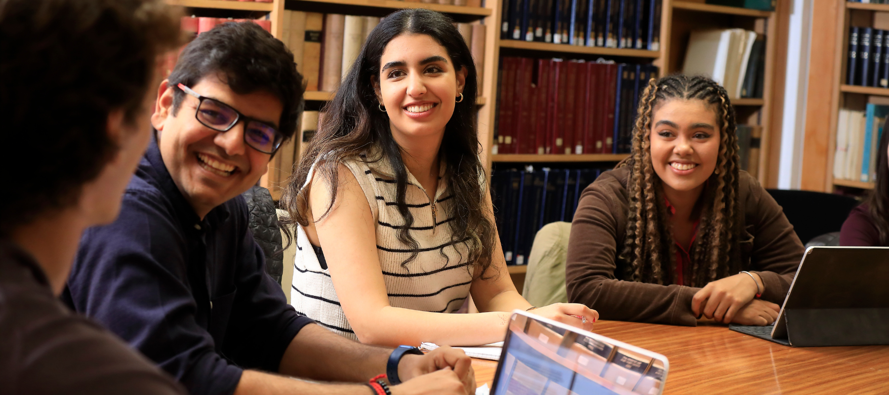 Students having a discussion inside the Bodleian Law Library