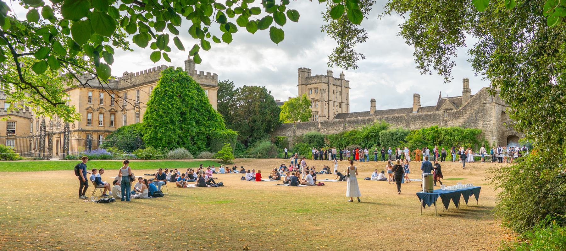 Image of students enjoying a BBQ at New College