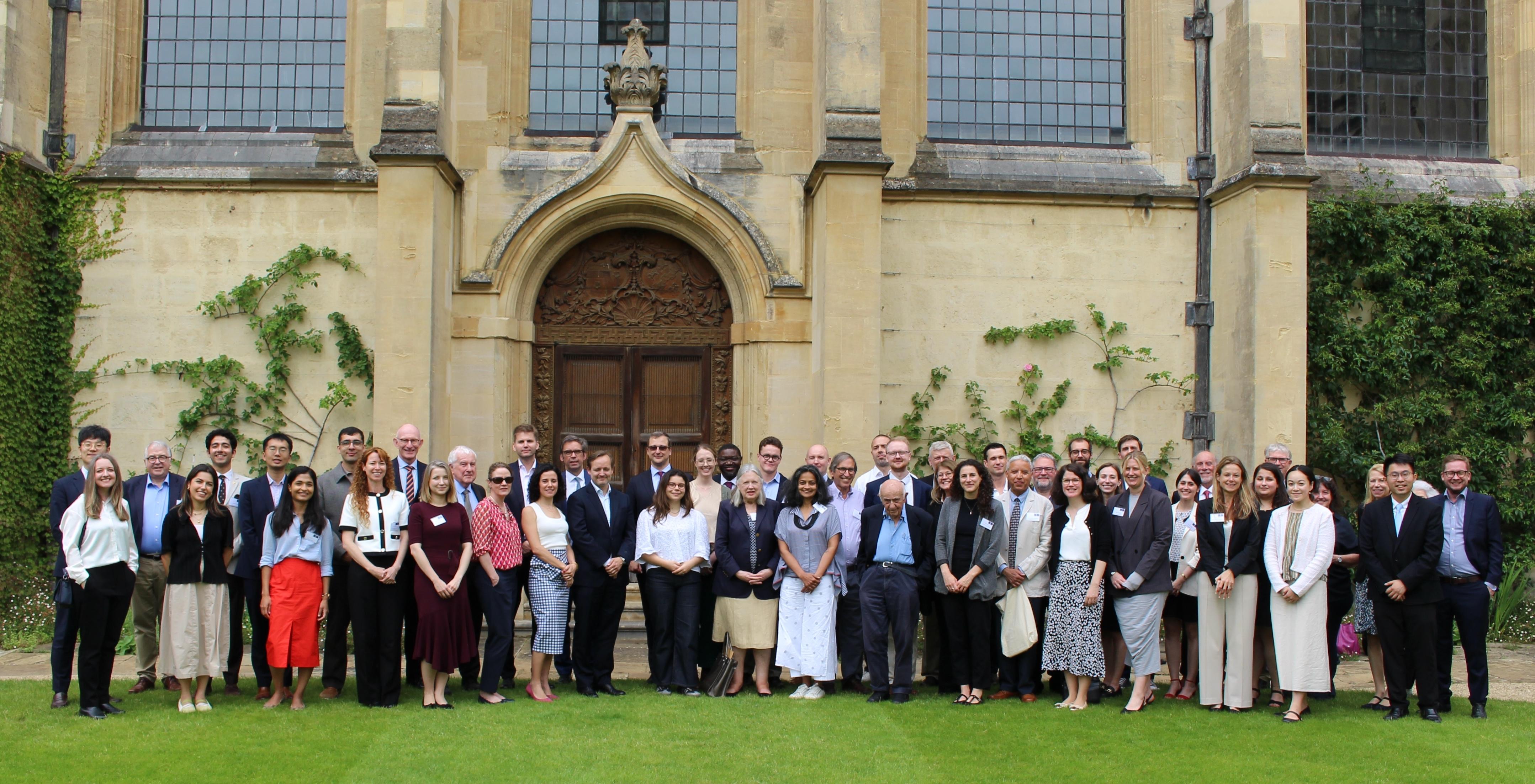 Participants of the International Law Workshop honouring Sir Ian Brownlie QC standing outside All Souls College in Oxford