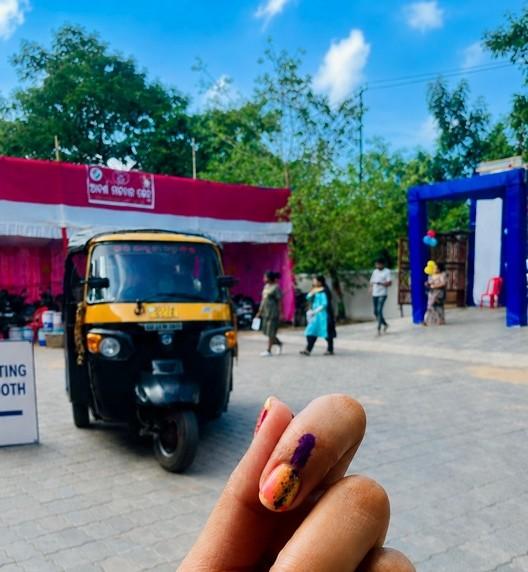Ayesha at the polling station with the indelible ink mark from casting her vote