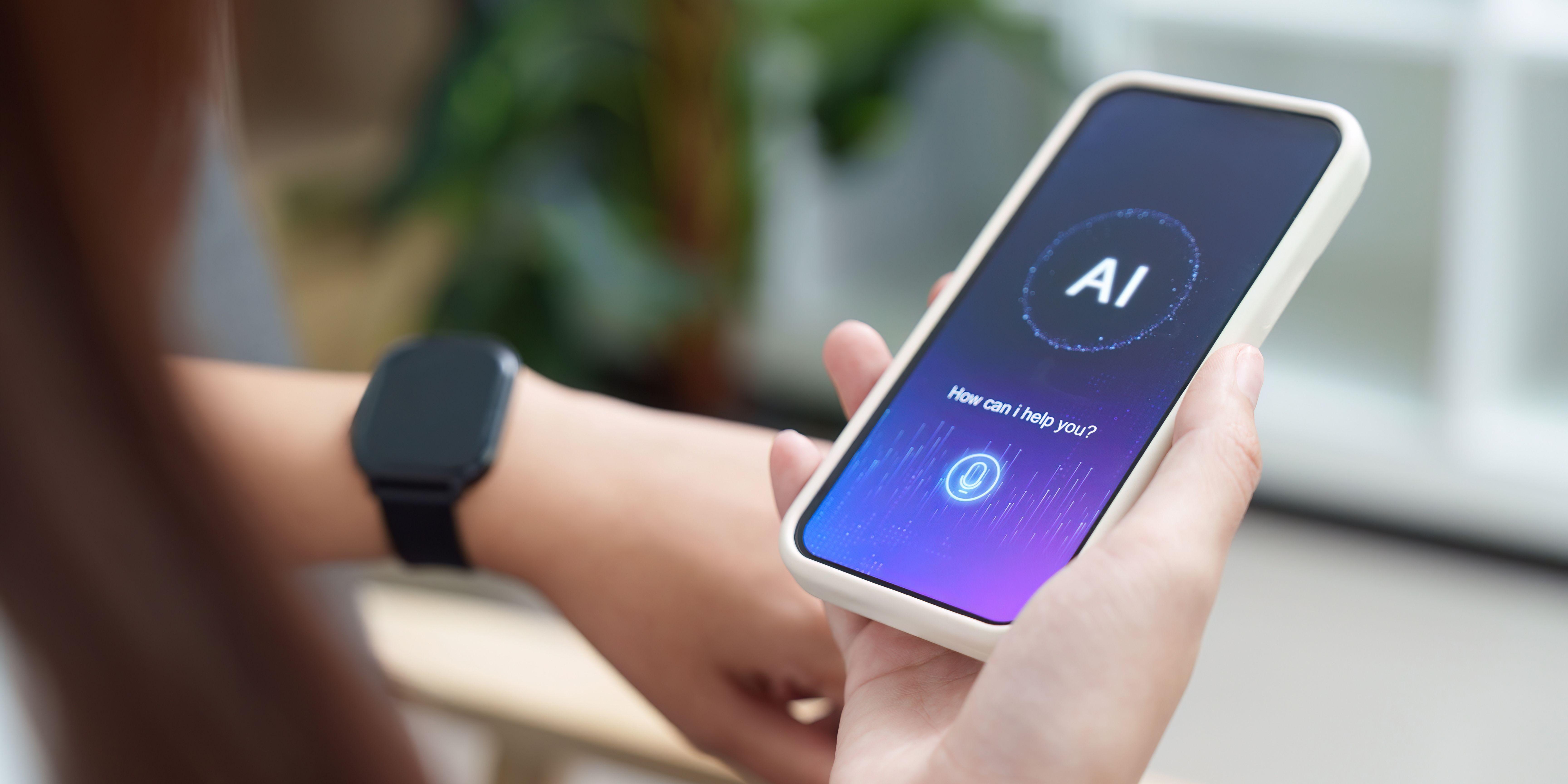 A young lady holding a mobile phone displaying an AI chat interface