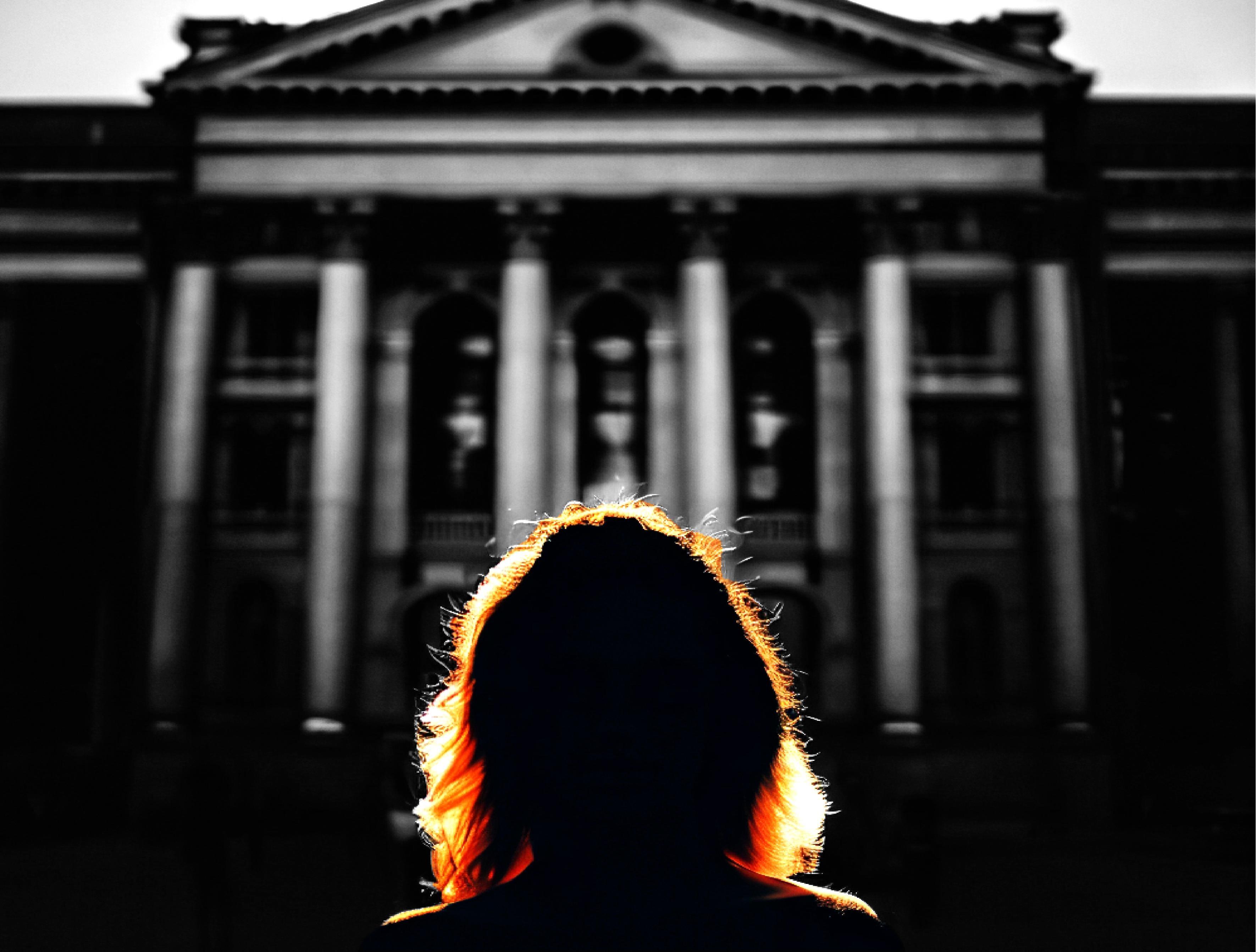 Lady stood in front of a court