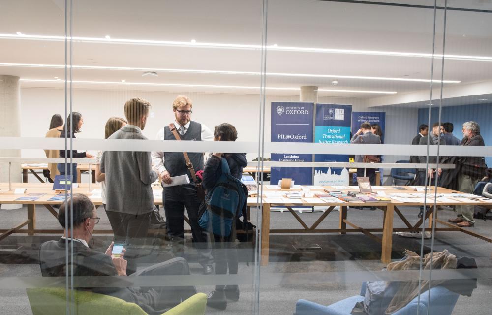 Students talking inside the Bonavero Institute