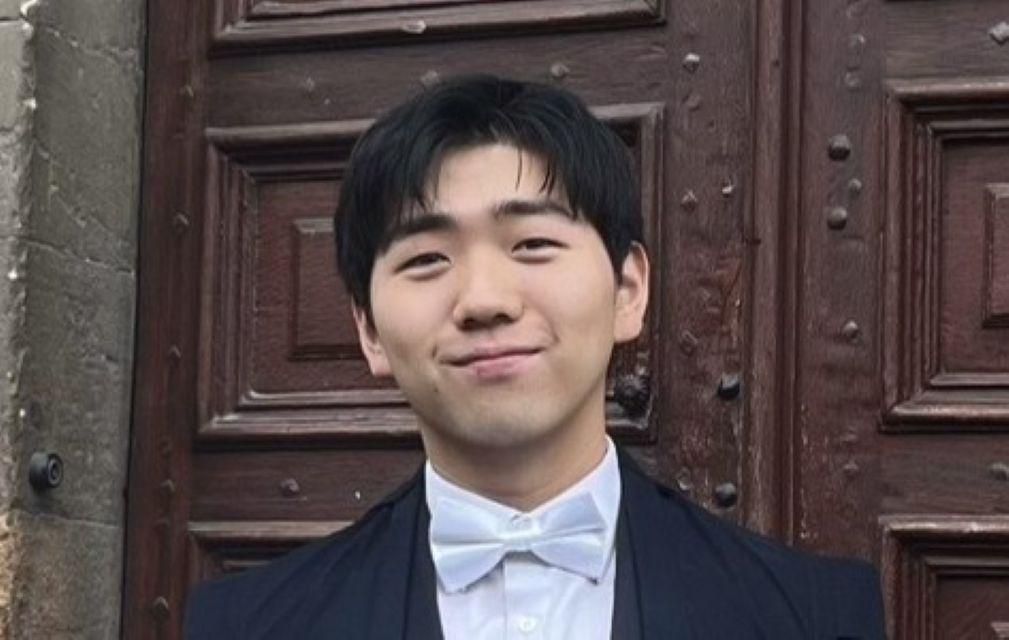 Headshot of James Ma looking at the camera