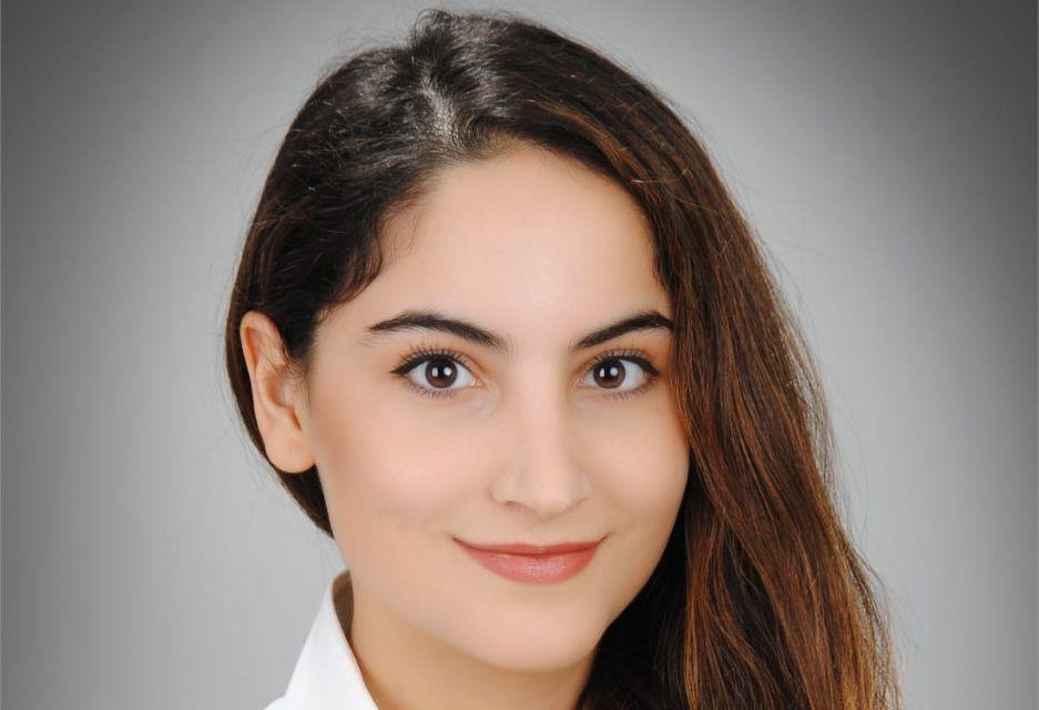 Headshot of Yasemen Oner facing the camera