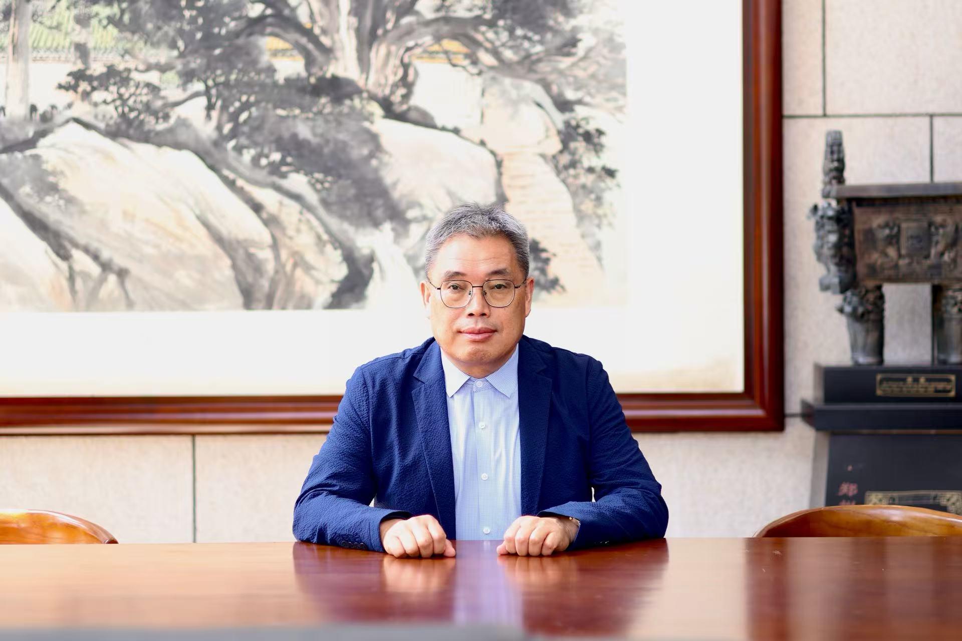 Jianguo Wang